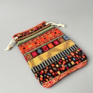 <span style="font-family:'macondo swash caps';font-size: 48px;color: #ffffff">Egyptian/Ethnic style drawstring Jute Pouch (Red)</scan>